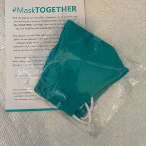 Brand new in plastic Tieks mask.